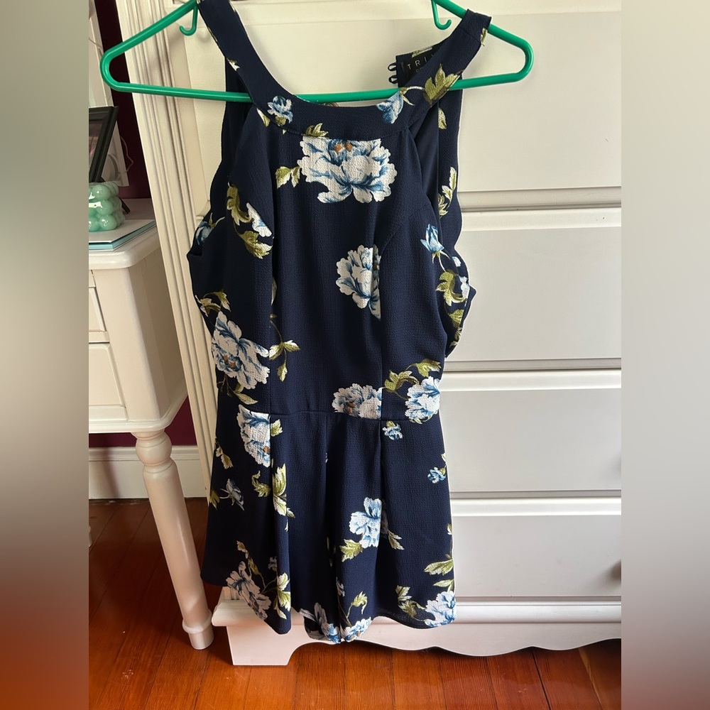 Navy blue floral romper from Francesca‘s size small